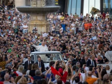 Pope Leo XIV greets the faithful at a Pentecost prayer vigil in St. Peter's Square, Saturday, June 7, 2025