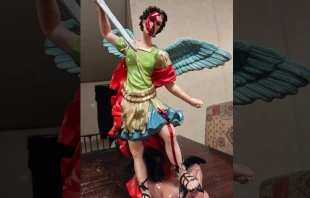 A statue of St. Michael the Archangel with what appears to have a substance resembling blood dripping from his forehead. Alicia Martinez
